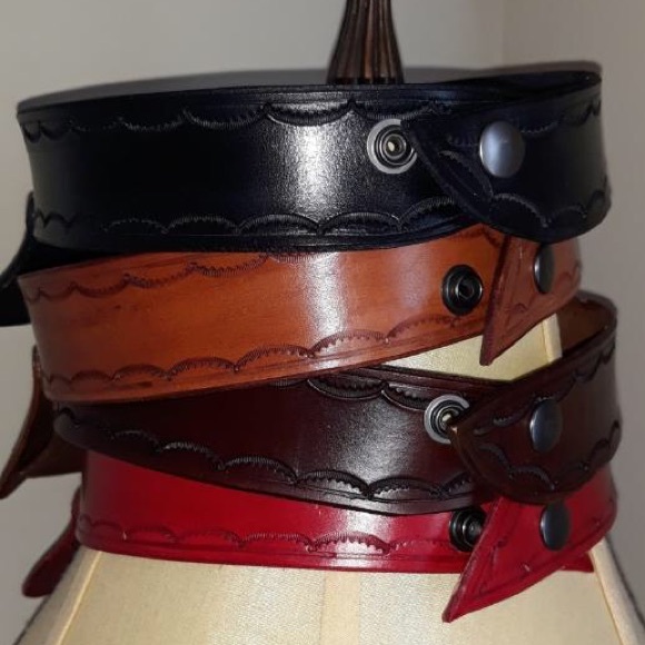 Distressed tan,red,brown,black.Adjustable snap closure. SM MED LG. $65 - Picture 2 of 2